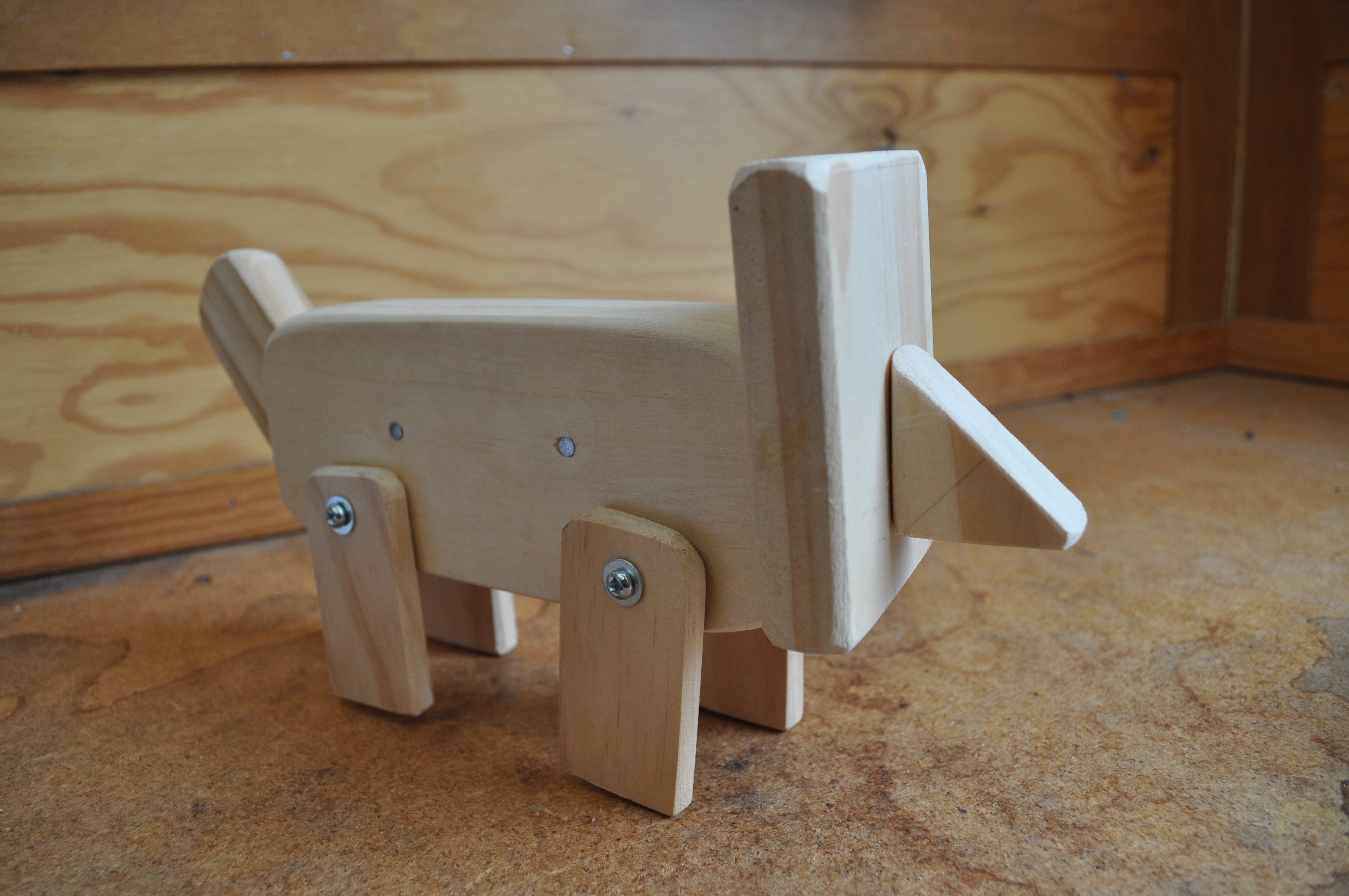 Woodworking Bus Program: wooden animal sculpture created by child