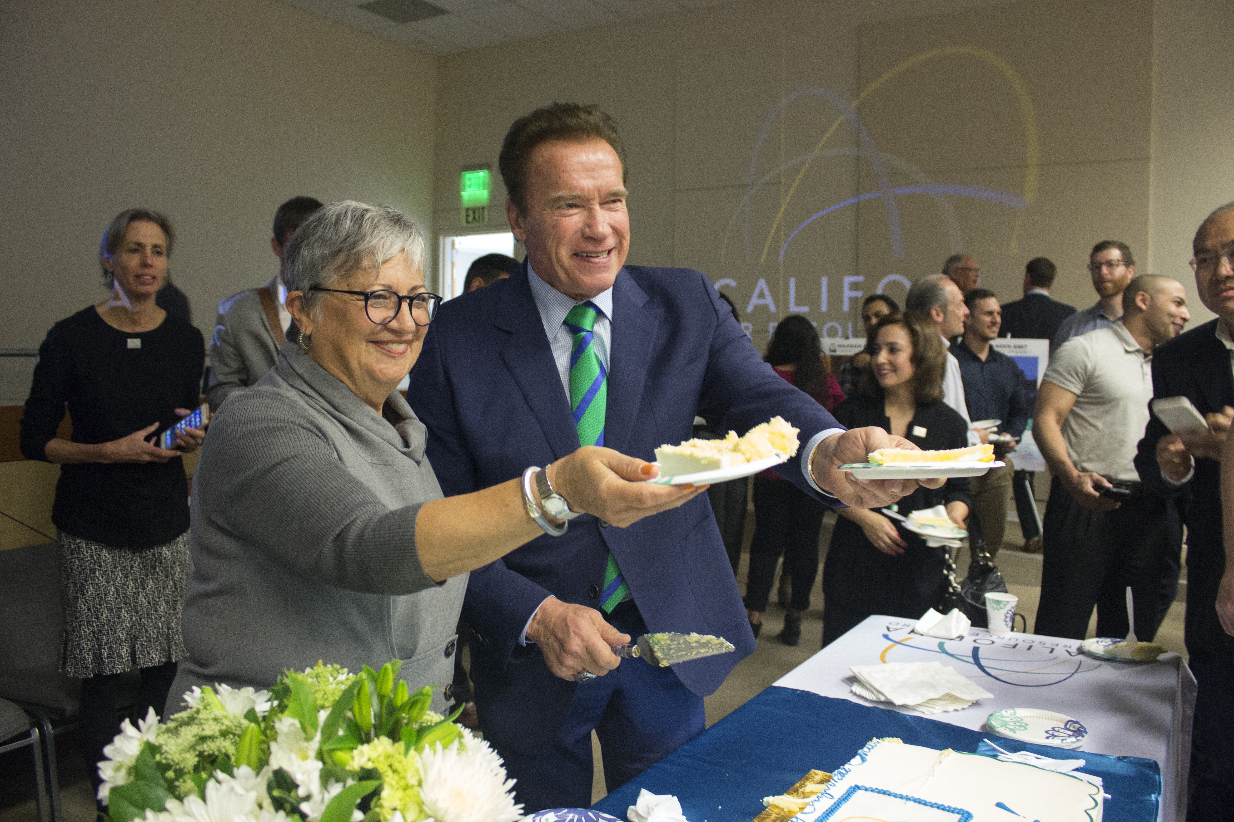 Chair Nichols & former Governor Schwarzenegger hand out cake for 50th Anniversary Celebration