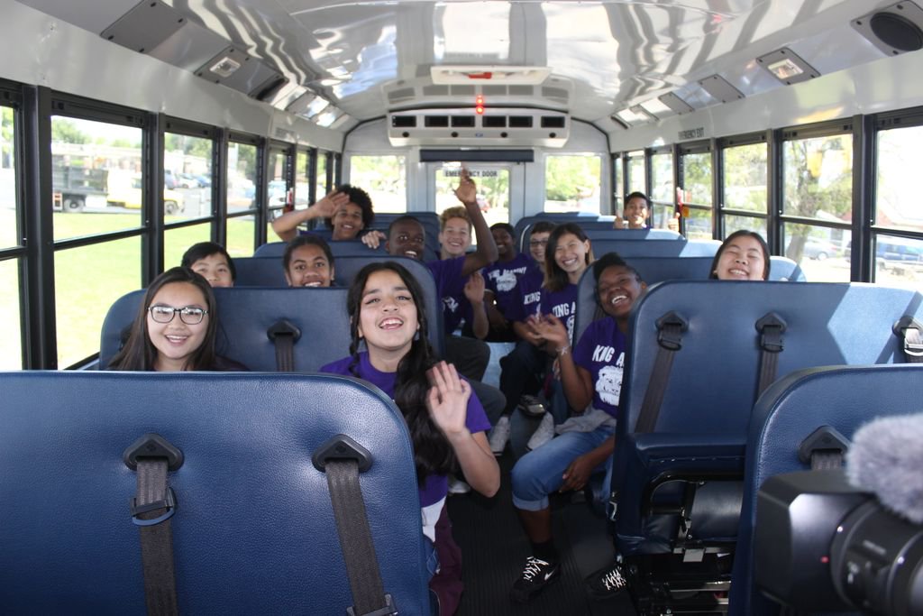 Schoolkids on electric bus