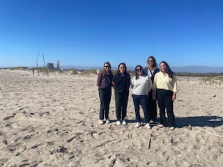 Figure 3: Participants from CFROG, CEC, GO-Biz, CARB and CAUSE learning about the Ormond Beach Generating Station in the background
