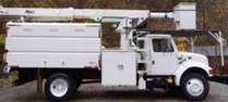 Image of cutaway truck upfitted for boom lift. This is considered a work truck