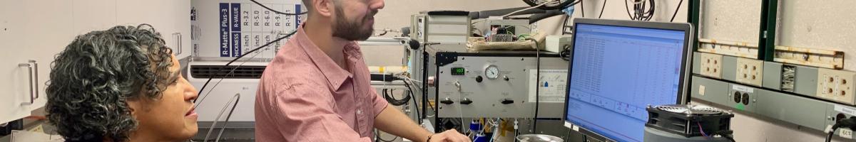 Photograph of Chair Randolph inside a mobile air monitoring platform