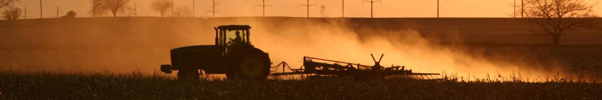 Ag tractor plowing field