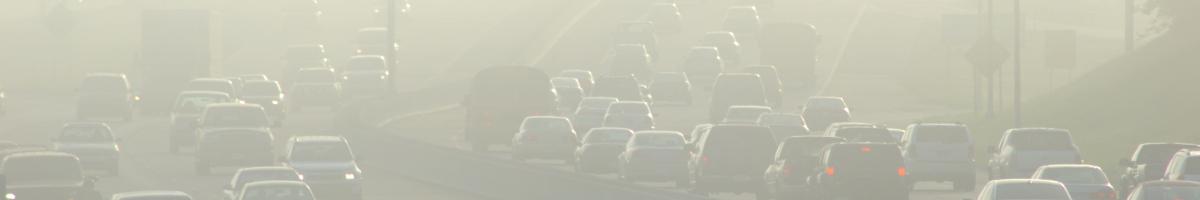 traffic on smoggy freeway