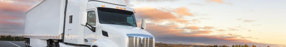 heavy-diesel truck at sunrise