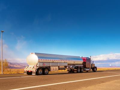 heavy-duty tanker trucks on rural road