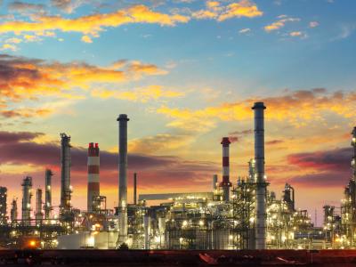 refinery at sunset