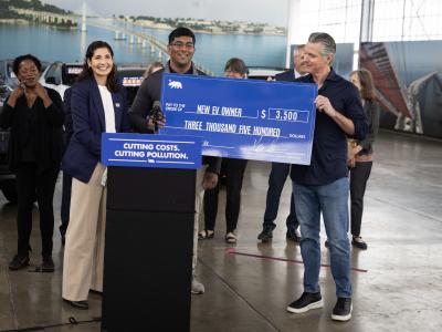 Governor Newsom and CARB Chair Lauren Sanchez present MyFirstEV recipient with instant purchase rebate